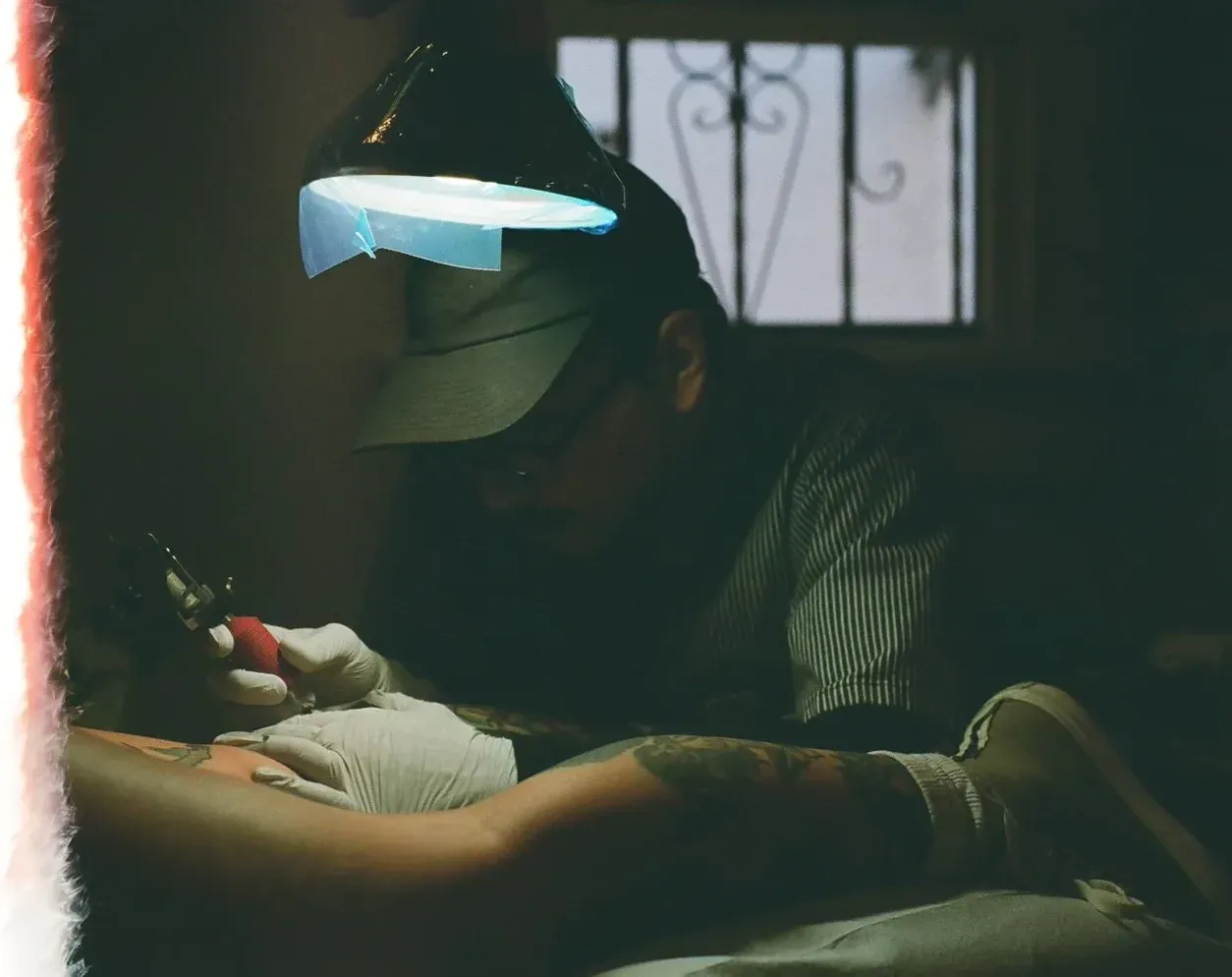 Artist working under studio light